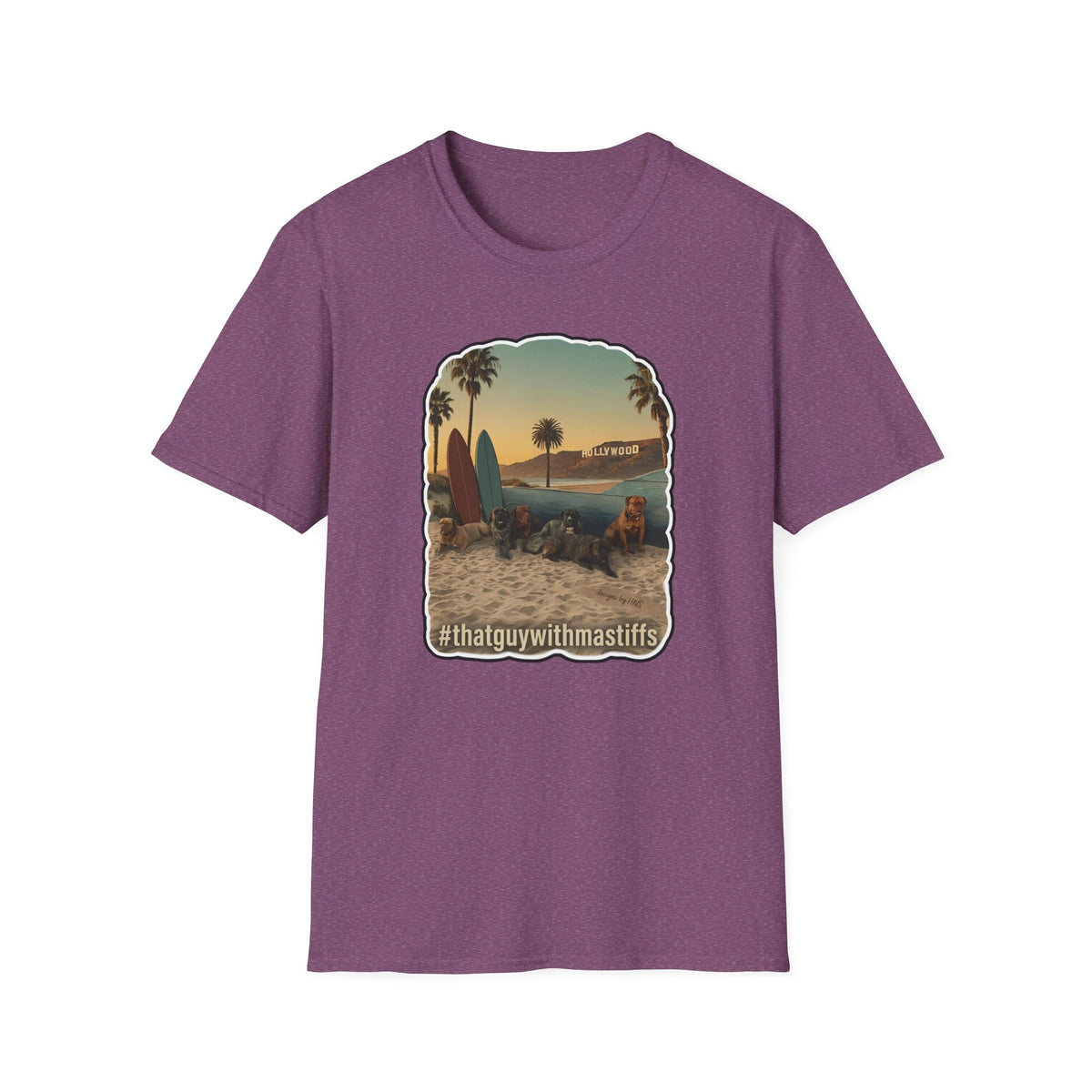 A heathered maroon short-sleeve t-shirt with a central graphic print of a beach scene featuring surfboards, palm trees, and a house, with the text '#thatguywithmastiffs' printed below the graphic.