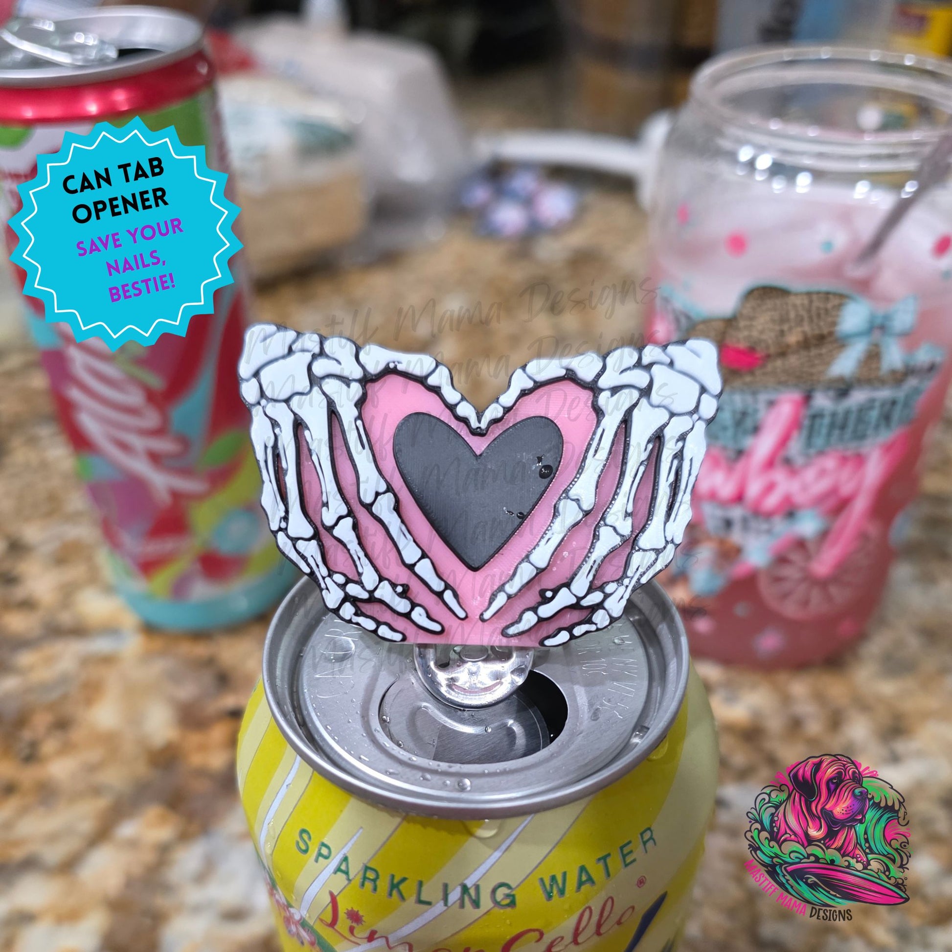 3D printed skeleton heart can tab opener on sparkling water can, spooky pink drink tab lifter for long nails, acrylic nails, and goth Halloween gifts.