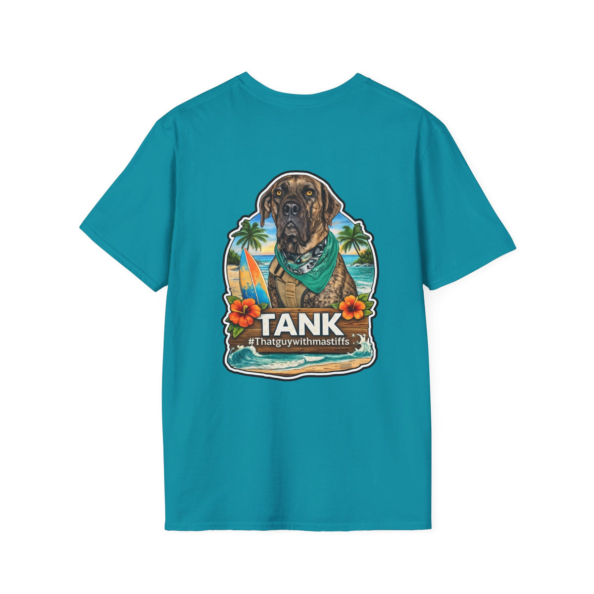 A tropical blue gildan unisex backside of shirt mockup tee featuring Official That Guy With Mastiffs Tank graphic design featuring a brindle mastiff Tank with a surfboard, palm trees, sunset, ocean waves, and #thatguywithmastiffs text.