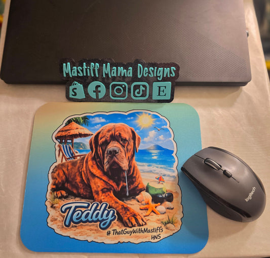 Official That Guy With Mastiffs Teddy mouse pad shown on a desk with ombre background and beach mastiff artwork.